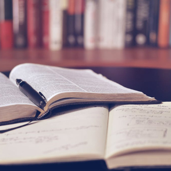 closeup of open books in a library