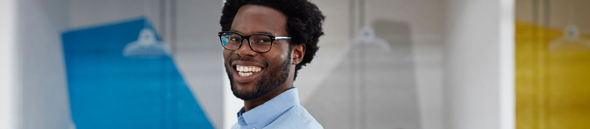 person smiling in office 